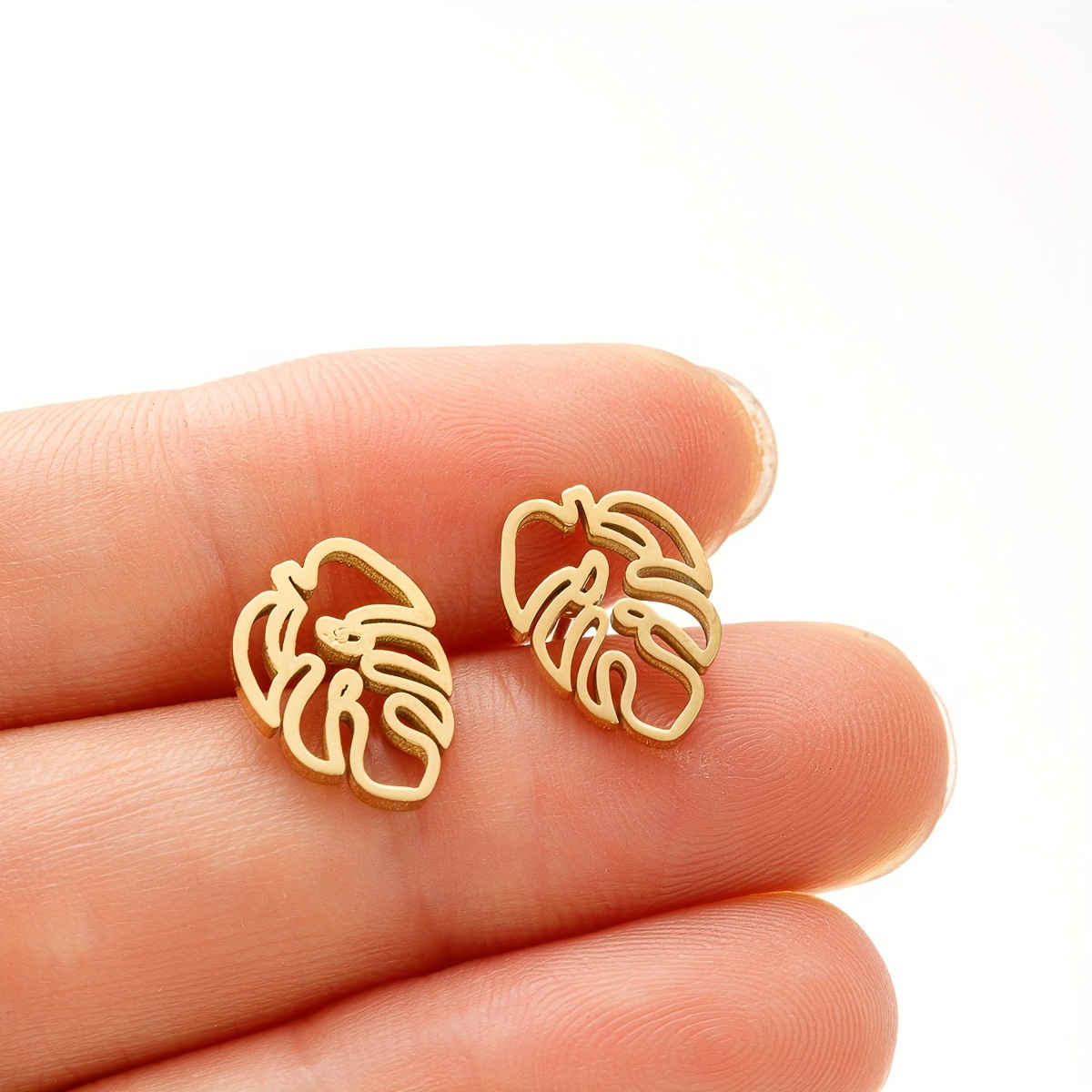 1 paar chique gouden monstera  - The Jewelry & Watches recensie en prijs